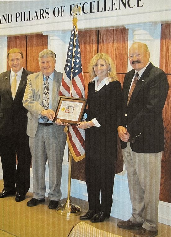 David-Cobb;-John-Dalton,-former-Inland-president;-Sue-Cobb,-retired-employee-of-45-years;-John-Fortier,-former-board-member-dedication-of-flag-May-2014.jpg